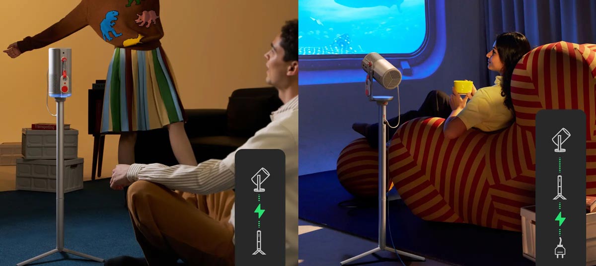 Zwei Personen mit futuristischen Beamern im Raum.