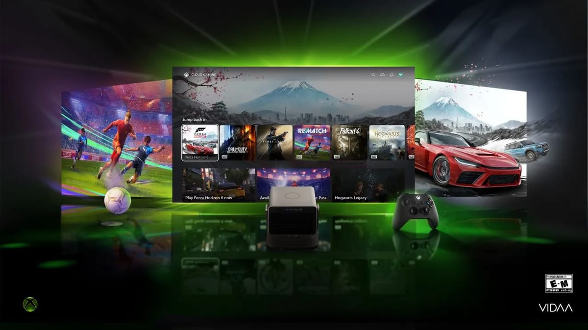 Gaming-Setup mit Bildschirm, Beamer und Controller.