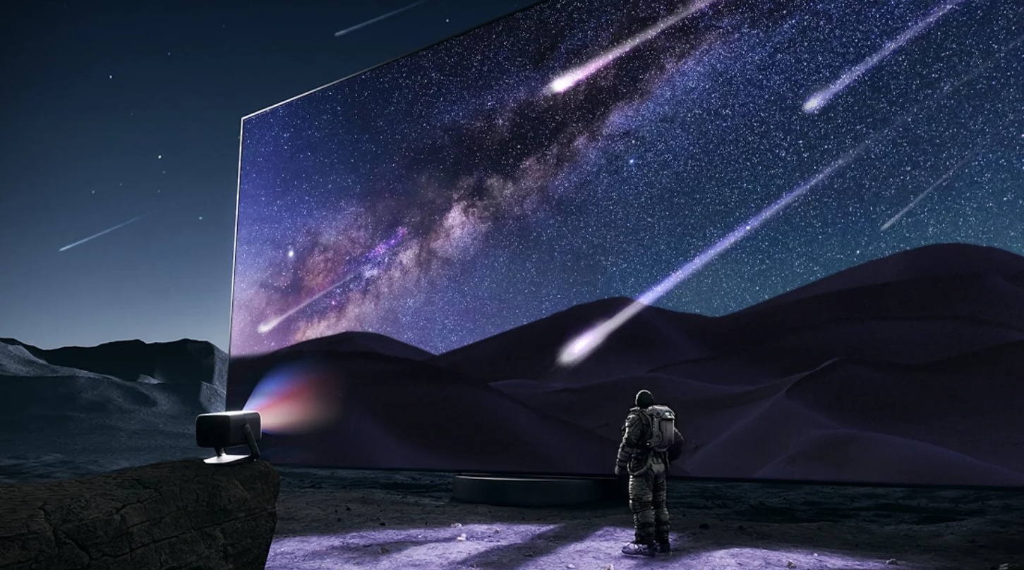 Astronaut betrachtet Sternenhimmel auf riesiger Leinwand.