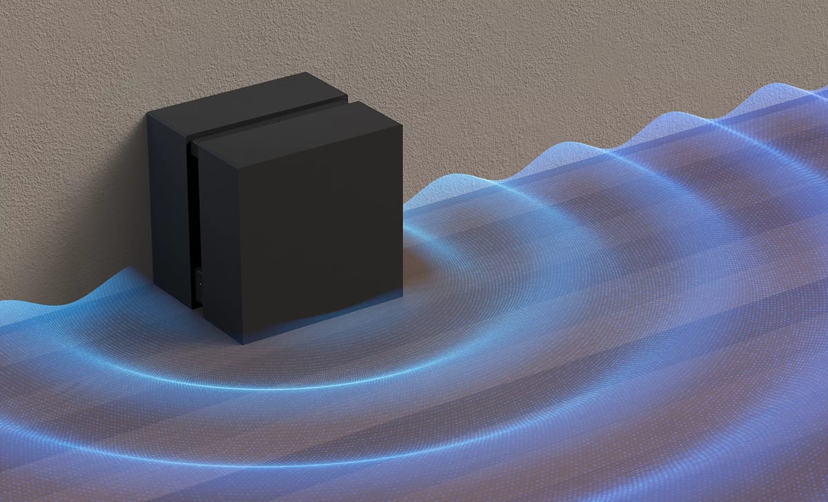 Schwarzer Beamer mit blauen Lichtwellen.