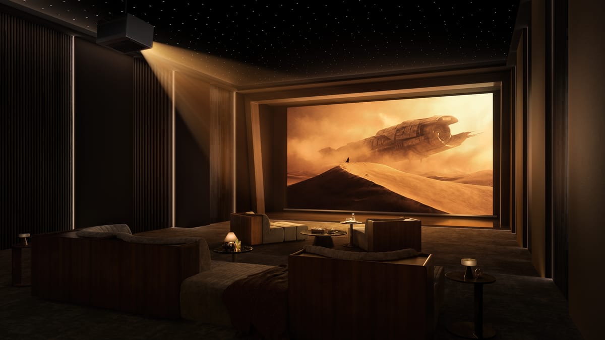 Luxuriöses Heimkino mit Beamer und Sternenhimmel.