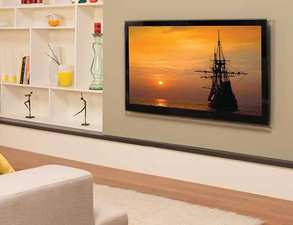 Sanus VLL5-B2 mit flach montiertem Fernseher im Wohnzimmer.