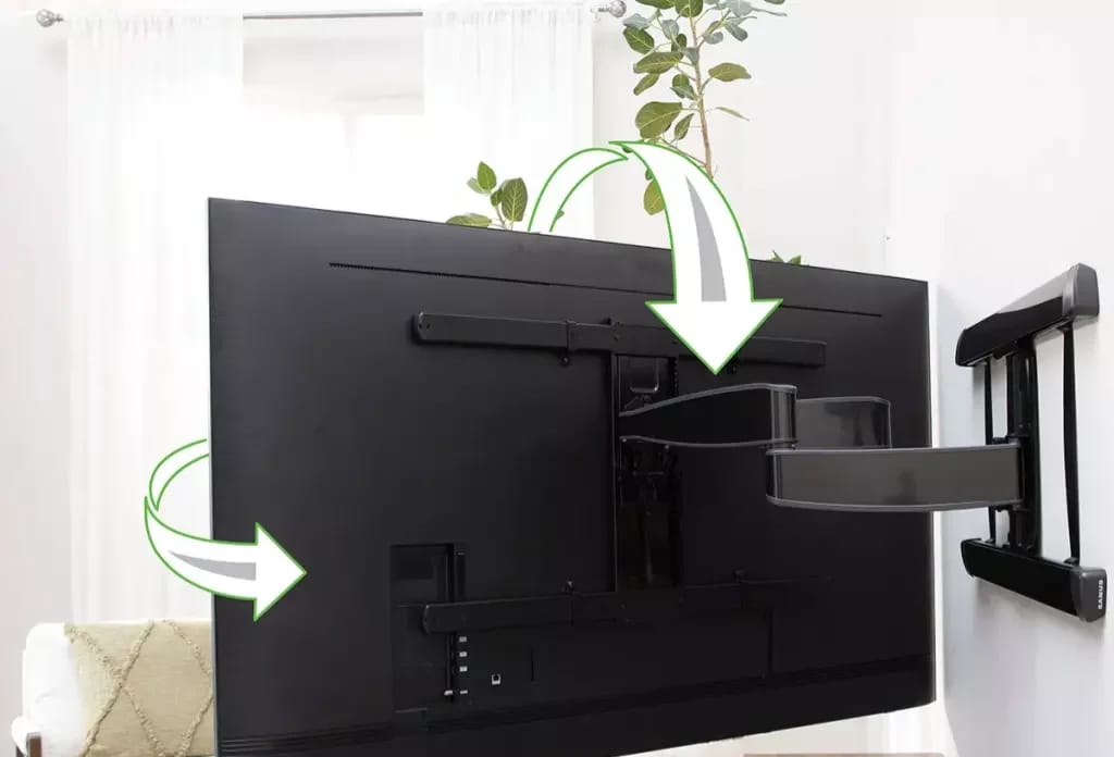 Großer Fernseher an der Sanus VXF830-B2, zur Seite geschwenkt und geneigt.