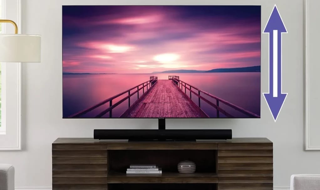 Fernseher mit Pfeilen für Höhenverstellung.